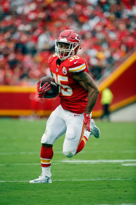 Kansas City Chiefs Charcandrick West runs for yardage against the New York Jets during a NFL football game on Sunday, Sept. 25, 2016, in Kansas City, Mo. The Chiefs won, 24-3. (Photo by G. Newman Lowrance)