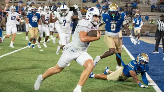Stone Earle runs in for a touchdown against Tulsa on August 30, 2025