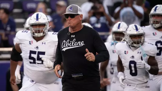 Keith Patterson leads the Wildcats on the field at TCU on September 13, 2025