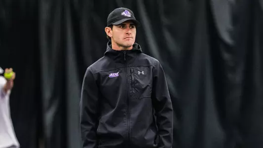 Jose Rastrojo watches ACU men's tennis play at TCU on January 11, 2026