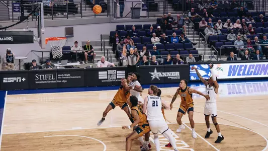 ACU players battle for a rebound during a Rich Smith free throw vs California Baptist on January 15, 2026