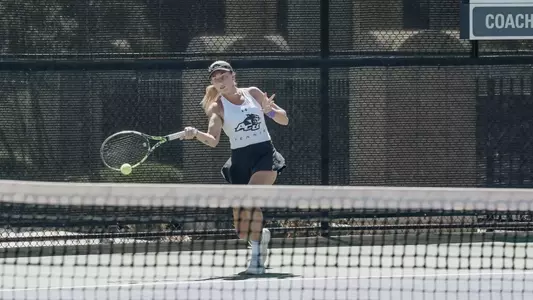 ACU women's tennis player hits ball during 2025 ACU Invite