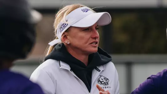 Jo Koons talks to her players during a practice on January 13, 2026