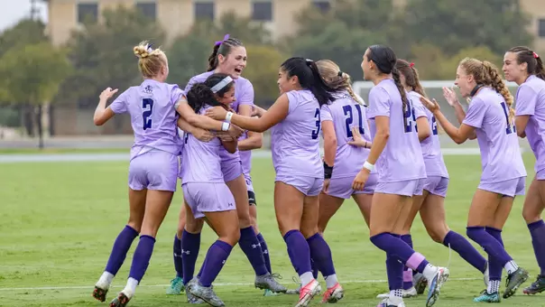 The Wildcats celebrate with Sophia Saludares after her assist against Central Arkansas on Oct. 4, 2026.