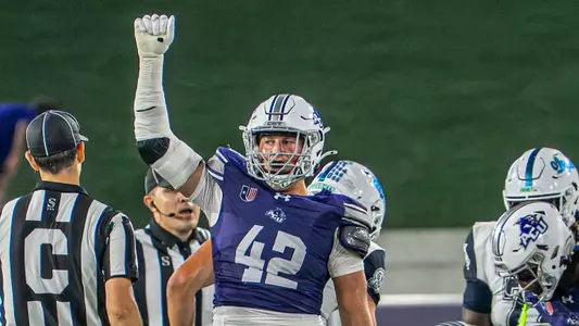 Hudson Page raises his fist after a third down stop against West Florida on Oct. 3, 2026