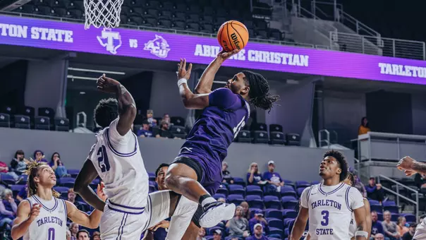 Bradyn Hubbard leaps to attempt a shot at close range at Tarleton State on Feb. 16, 2026