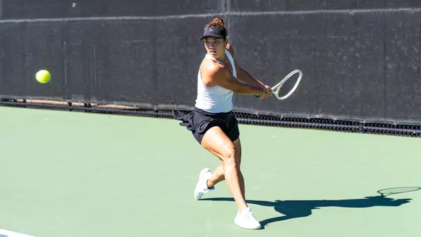 Masha Vrsalovic returns the ball to her opponent.