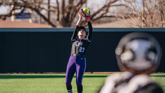 Audrey Lacina extends to make a catch in the infield against South Dakota State on February 10, 2026
