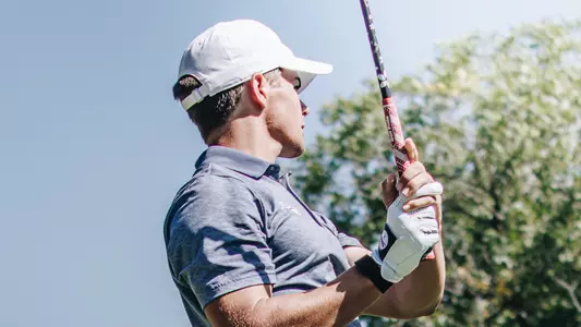 Colin Leonard watches a shot at an ACU men's golf practice in Abilene, Texas on Sept. 11, 2025.