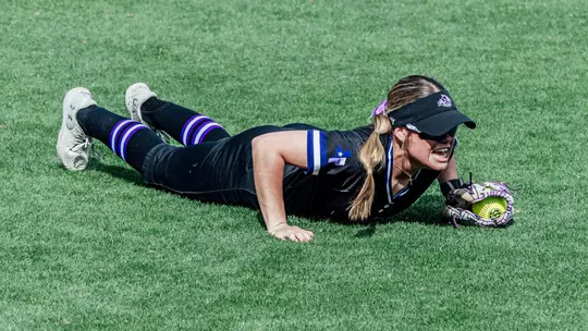 Ciana Arguijo celebrates a diving catch against Syracuse at the 2026 Bevo Classic in Austin