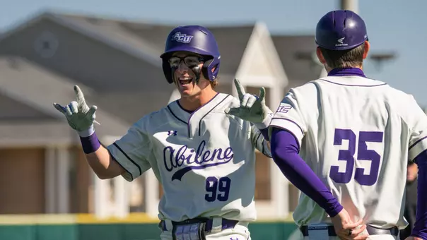 Maddox Miesse celebrates after reaching first base in ACU's 12-3 win over Oral Roberts at Crutcher Scott Field at Bullock Brothers Ballpark on Feb. 21, 2026.