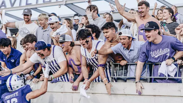 ACU student section celebrates with receiver Luke Moffitt after beating Tarleton State on Nov. 1, 2025