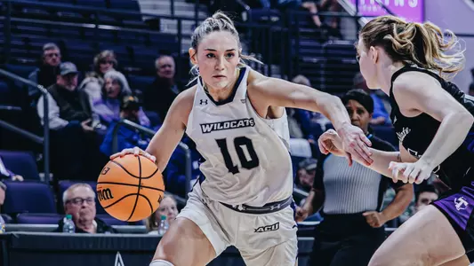 Payton Hull dribbles past a defender in ACU's 68-65 win over Tarleton State at Moody Coliseum on Feb. 3, 2026.