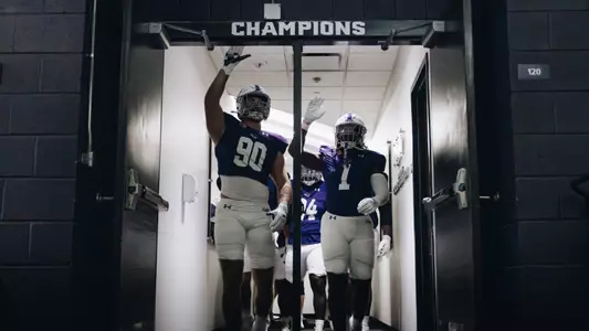 ACU players walk out of the home locker room before playing Stephen F. Austin on September 6, 2025
