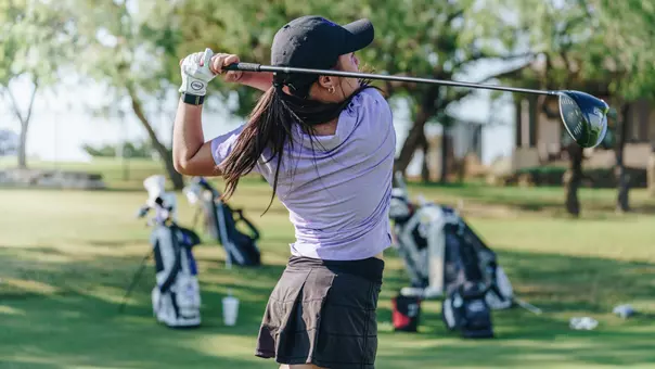 Jiyu Han takes a swing at an ACU women's golf practice in Abilene, Texas on Oct. 16, 2025.