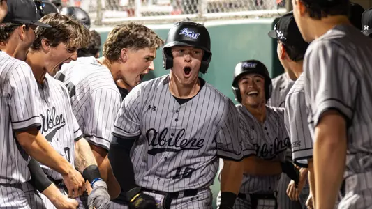Brady Gray celebrates a home run in the dugout in ACU's 12-5 win over New Mexico in Albuquerque, N.M. on March 20, 2026.
