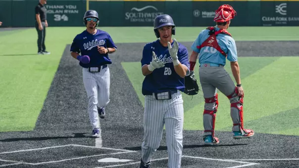 Gavin Brzozowski celebrates crossing home plate during an ACU game vs Loyola Marymount on March 15, 2026