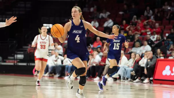 Erin Woodson dribbles down the court in ACU's matchup versus Illinois State in Normal, Ill. on March 27, 2026.
