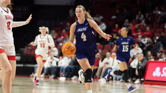 Erin Woodson dribbles the ball down the court in ACU's matchup versus Illinois State in Normal, Ill. on March 27, 2026.