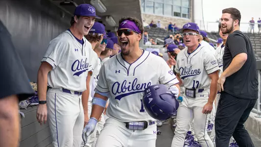 Diego Cardenas celebrates a home run in the dugout in ACU's series versus St. Thomas at Crutcher Scott Field at Bullock Brothers Ballpark on Feb. 13-15, 2026.