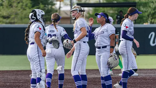 Leah Meyer and teammates come together during a game versus Utah Valley on April 10, 2026