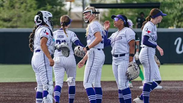 Leah Meyer and teammates come together during a game versus Utah Valley on April 10, 2026