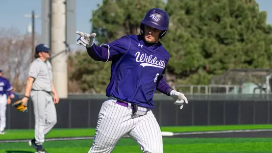 Grant Watkins points to the dugout after hitting a home run in ACU's 8-7 win over Oral Roberts at Crutcher Scott Field at Bullock Brothers Ballpark on Feb. 22, 2026.
