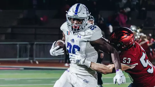 ACU running back Jordon Vaughn breaks through a tackle at Southern Utah on October 18, 2025