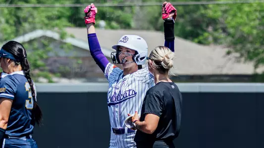 Audrey Lacina celebrates after reaching first base against California Baptist on April 25, 2026