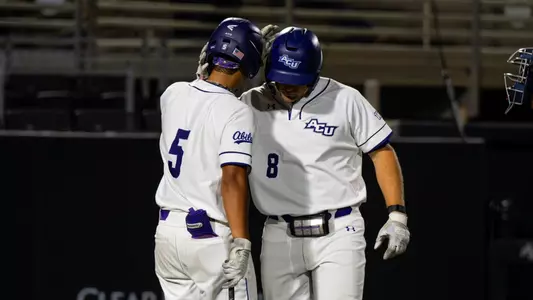 Grant Watkins celebrates his home run with Nick Arias in ACU's matchup with CBU at Crutcher Scott Field at Bullock Brothers Ballpark on April 2, 2026.