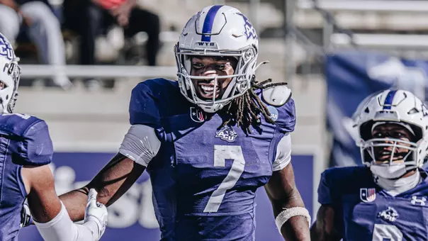 Javon Gipson smiles and jogs to the sideline after a touchdown catch against Lamar on November 29, 2025