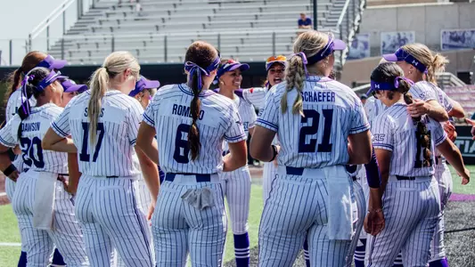 ACU softball team huddles up before a game against California Baptist on April 25, 2026
