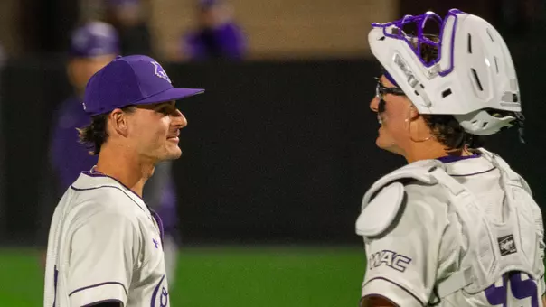 Blaine Palmer and Maddox Miesse congratulate each other in ACU's matchup with St. Thomas at Crutcher Scott Field at Bullock Brothers Ballpark on Feb. 14, 2026.