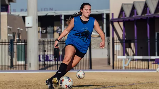 Gracie Kelly dribbles the ball during an ACU soccer practice at Elmer Gray Stadium on Feb. 12, 2026.