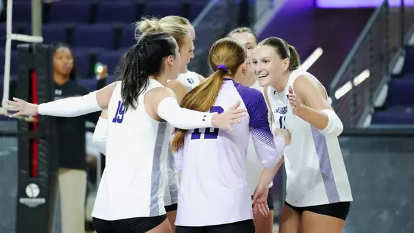 ACU volleyball players come together after a point in the Purple-White intrasquad scrimmage on August 11, 2026