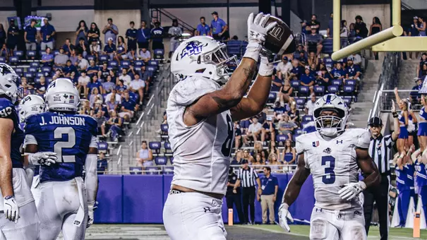 Itty Henry celebrates a touchdown catch against TCU in September 2025