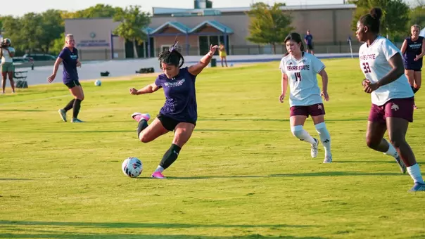 Mikayla Abrenica takes a shot against Texas State in an exhibition match on August 8, 2026