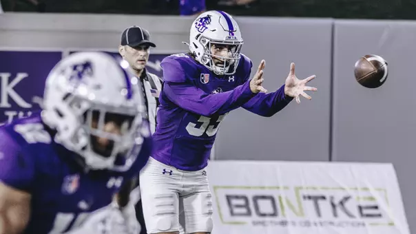 Hugo Nash prepares to catch the snap and punt against Austin Peay in September 2025