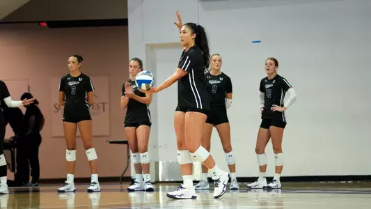 Hannah Gonzalez prepares to serve in ACU's exhibition match versus Texas Tech at Moody Coliseum on Aug. 14, 2026.