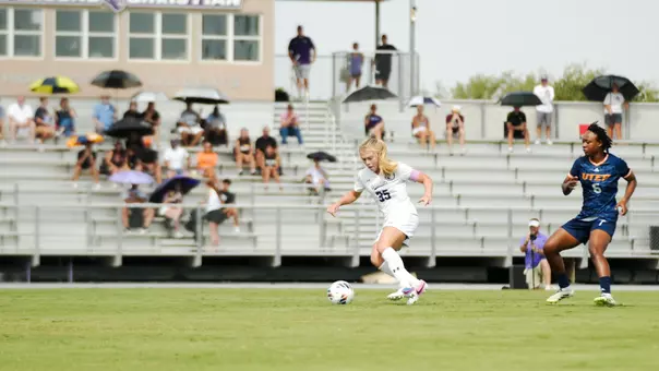 Baylie Simon dribbles past a defender in a game against UTEP on August 23, 2026.