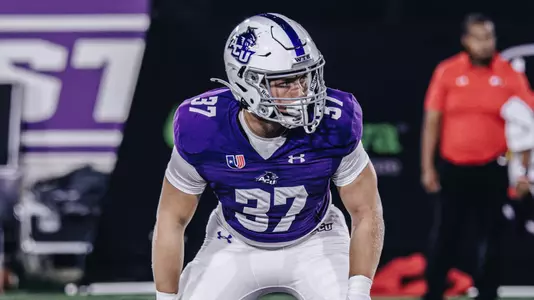 Trace Low prepares for a kickoff against Austin Peay in September 2025