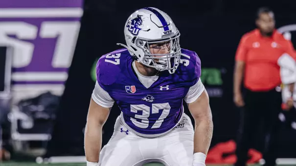 Trace Low prepares for a kickoff against Austin Peay in September 2025