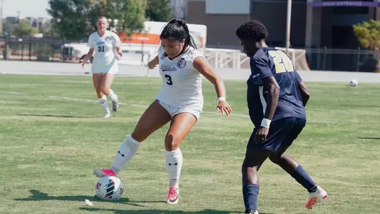 Mikayla Abrenica dribbling around an opponent against East Texas A&M on August. 30, 2026.