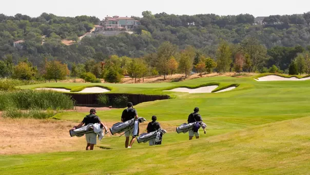 ACU men's golf student-athletes walk the course at Halbert National in Granbury, Texas.