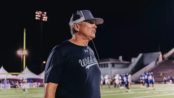 Head coach Keith Patterson looks out over the field at North Alabama during an October 2024 game