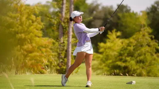 Jiyu Han admires a drive at Halbert National in Granbury, Texas.
