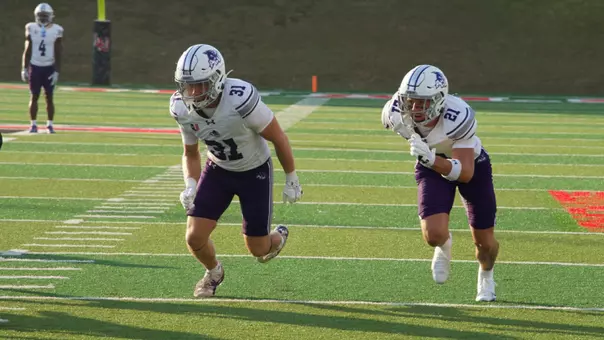 Trace Low and Carson Finney run during punt block at Lamar on August 29, 2026