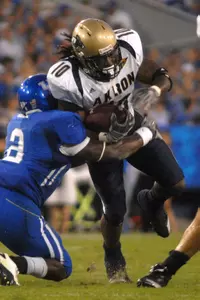 Football Gives Up 47-10 Decision at Kentucky Image
