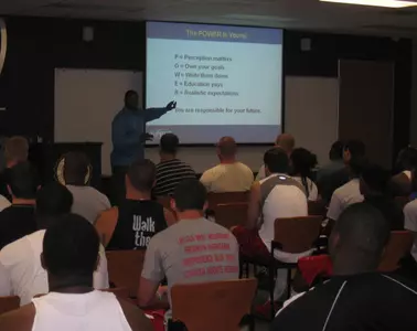 Troy Vincent Visits with Zips Football Image