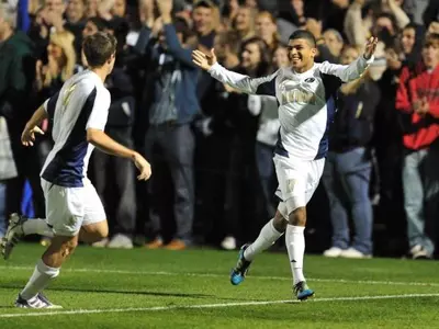 Attendance Record Falls as Zips Blitz Buckeyes, 3-1 Image